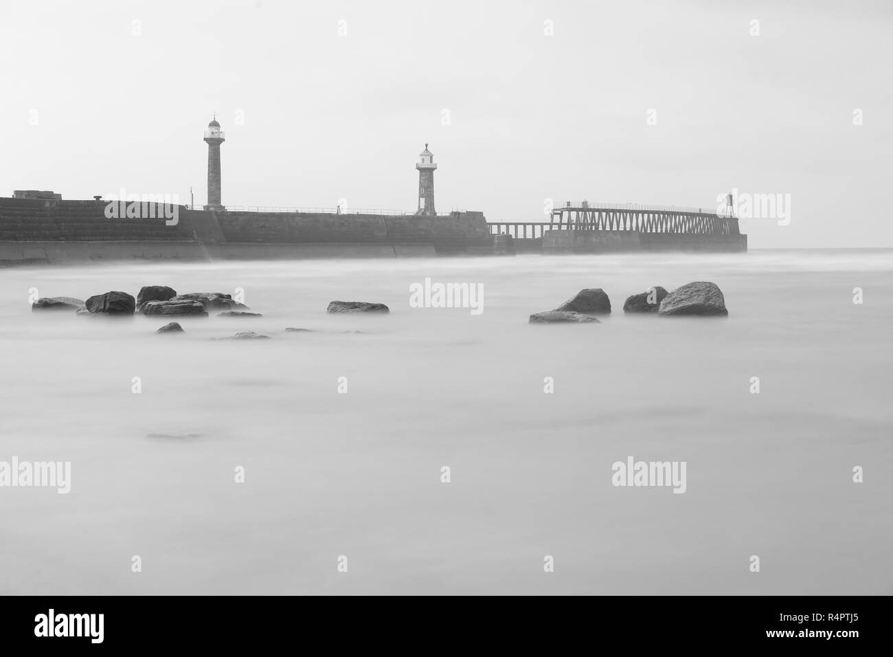 Whitby Piers & Lighthouses in North Yorkshire Stock Photo