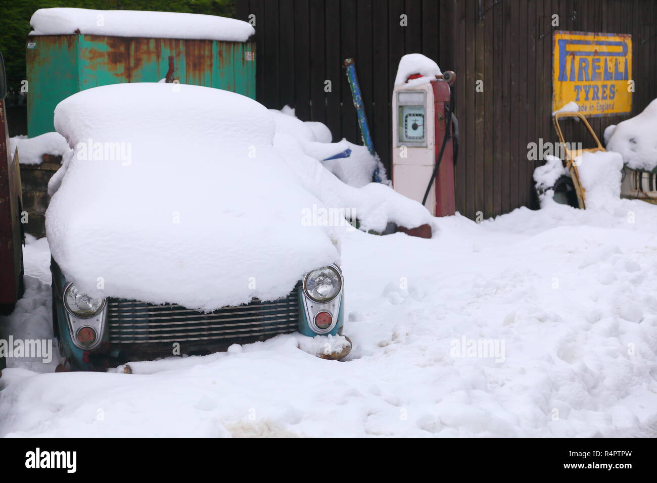 1958 Austin A40 Farina covered in snow on the filming location of Heartbeat in Goathland,North Yorkshire. Stock Photo