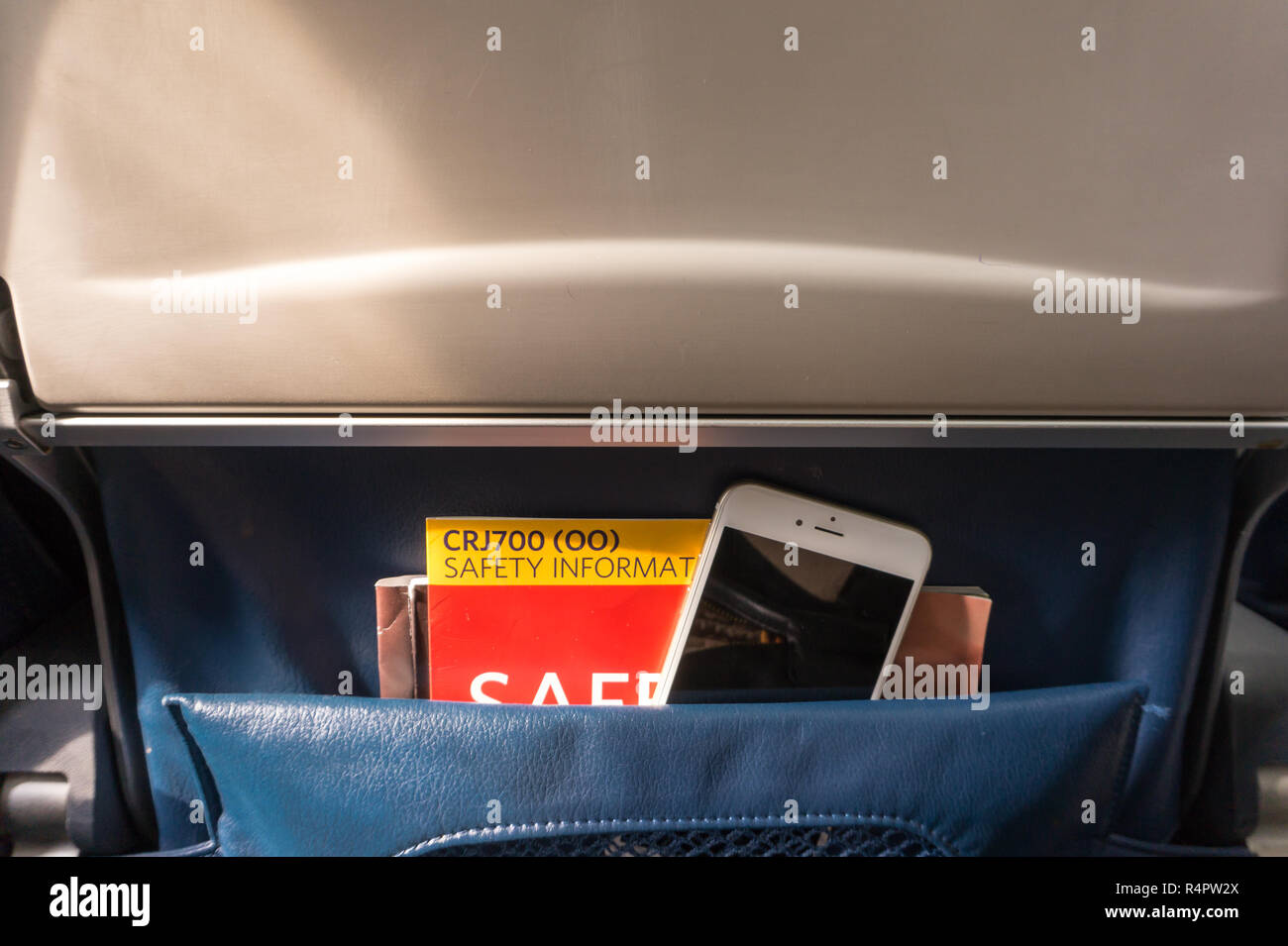 Close up of airplane seat back pocket 