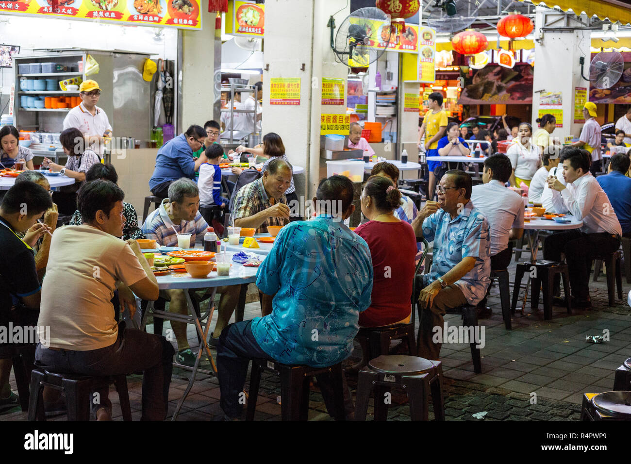Families Eating at Lou Wong Restaurant, Famous for Chicken, Rice, and Bean Sprouts (Tauge Ayam), an Ipoh Specialty.  Ipoh, Malaysia. Stock Photo