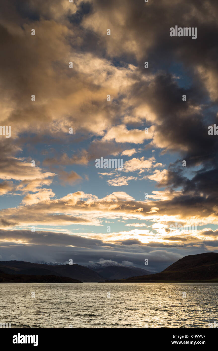 Dramatic morning sky looking east along Loch Broom from Ullapool, North-West Highlands of Scotland. Stock Photo
