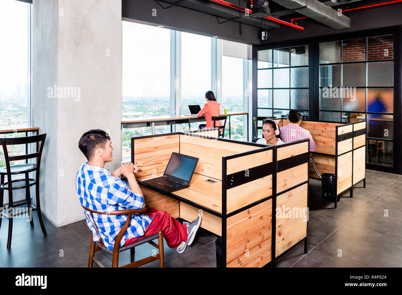 Start-up business people in coworking office Stock Photo