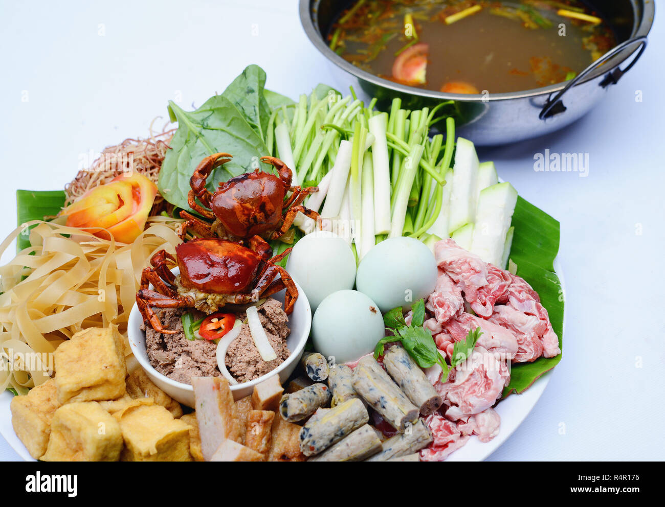 Prepared hot pot of Vietnamese countryside with local small crabs, tofu