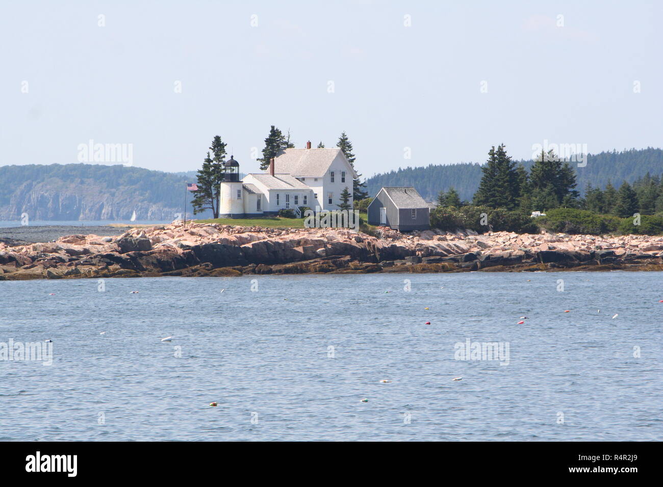 New England's Winter Harbor Lighthouse near Bar Harbor Maine and the Acadia National Park Stock Photo