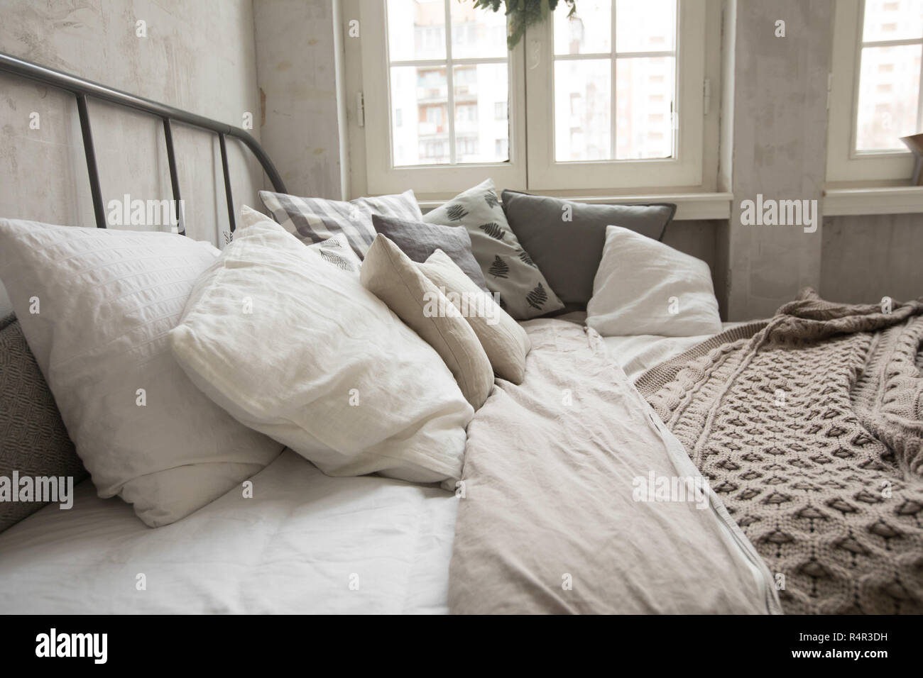 Pillows on comfortable bed Stock Photo