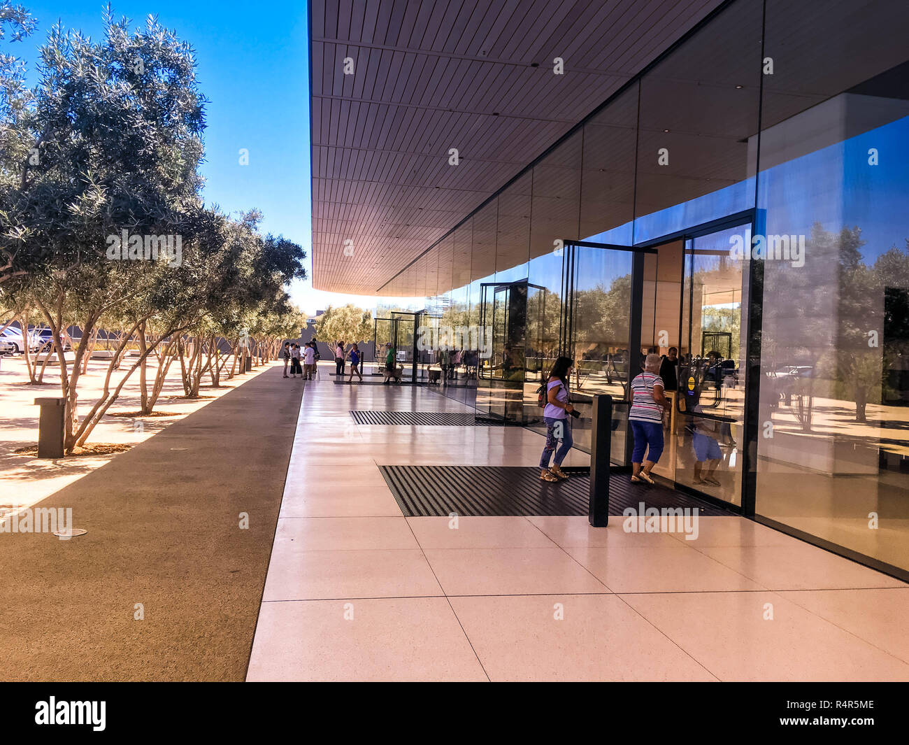 Apple Visitor Center, 1 Apple Park Way, San Jose, California, United States (USA) - August 5, 2018: Guest customers are interested of Apple products Stock Photo