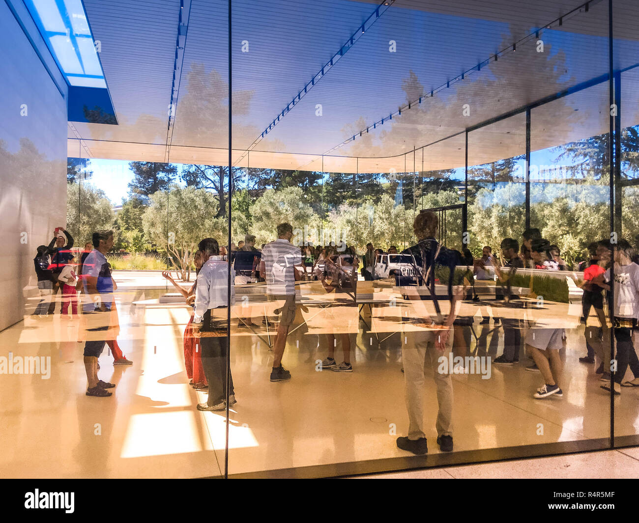 Apple Visitor Center, 1 Apple Park Way, San Jose, California, United States (USA) - August 5, 2018: Guest customers are interested of Apple products Stock Photo