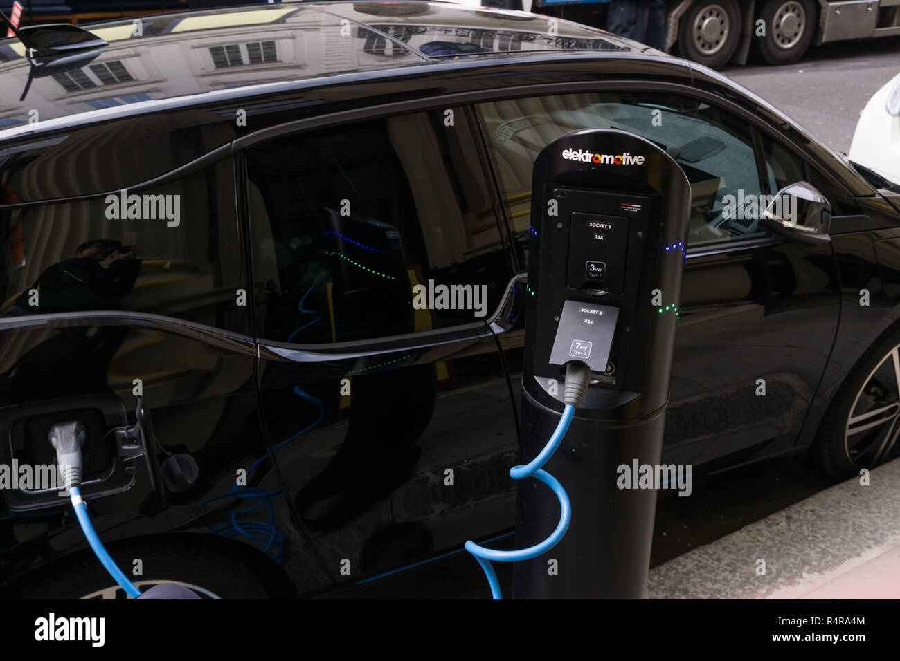 Electric cars charging on the street in London Stock Photo Alamy