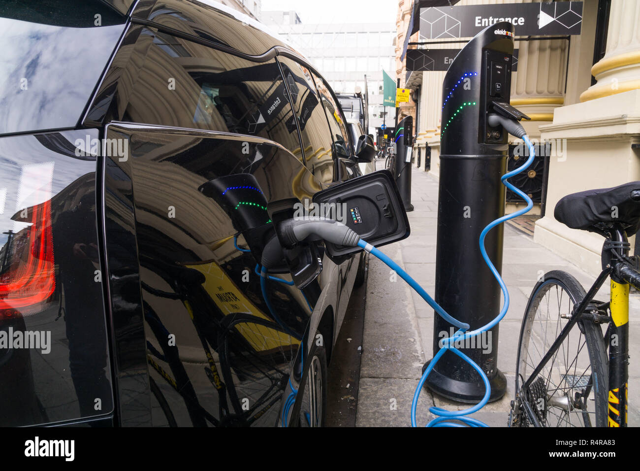 Electric cars charging on the street in London Stock Photo Alamy
