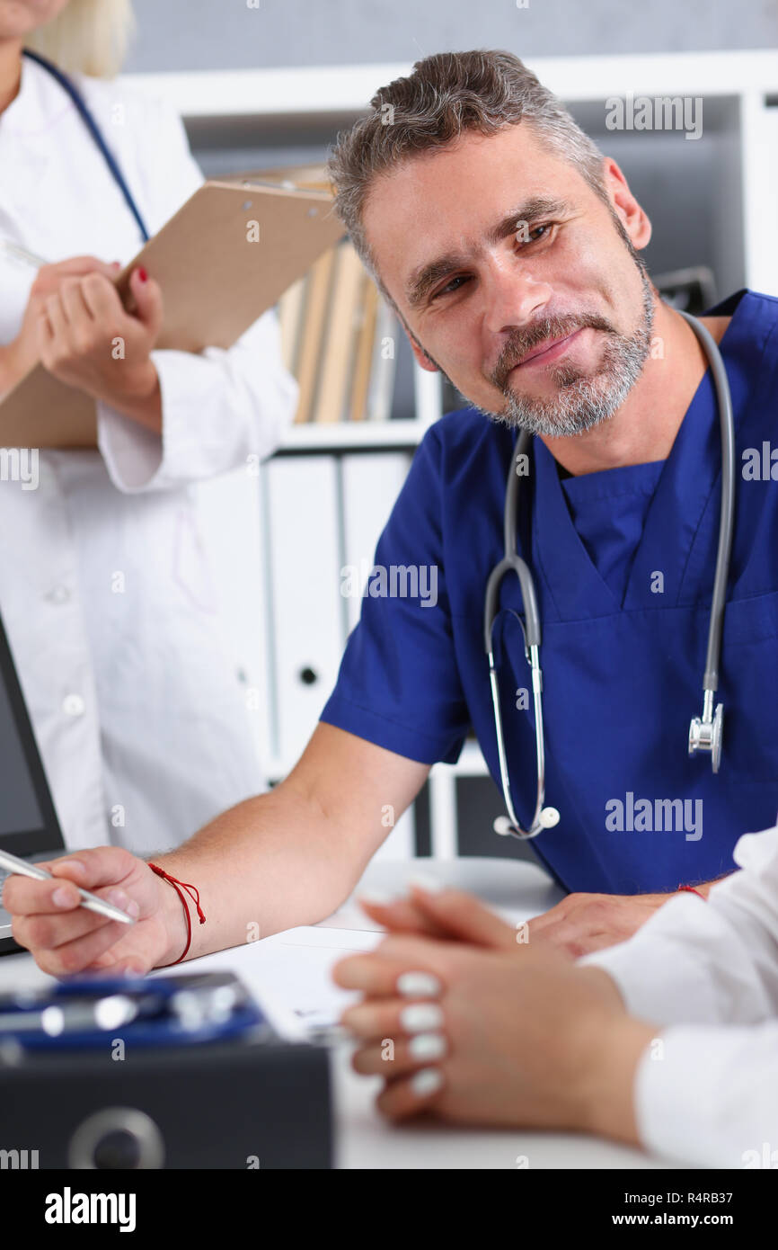 Mature male doctor talk hi-res stock photography and images - Alamy
