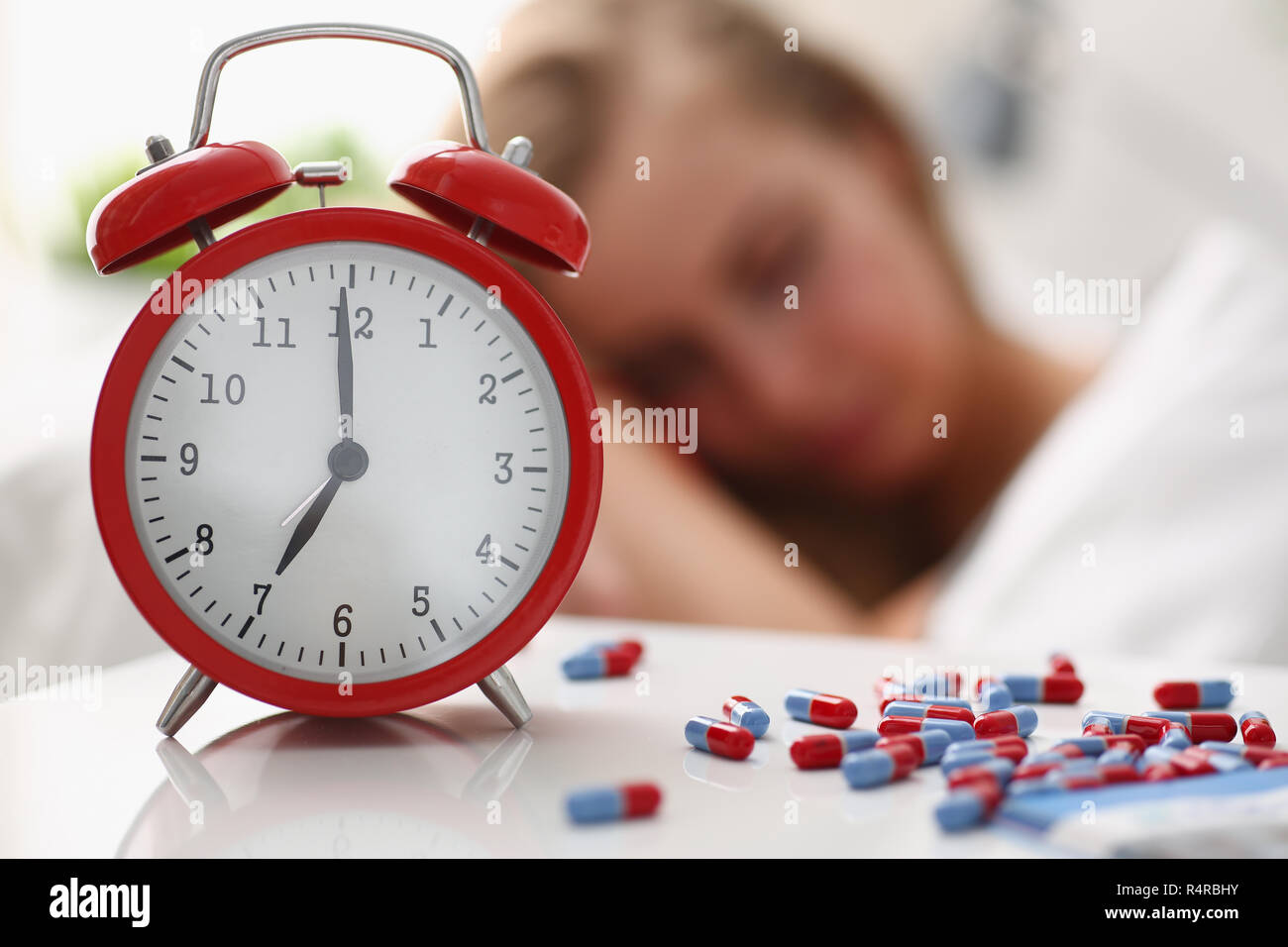 woman is ill take drugs sleep in bed Stock Photo