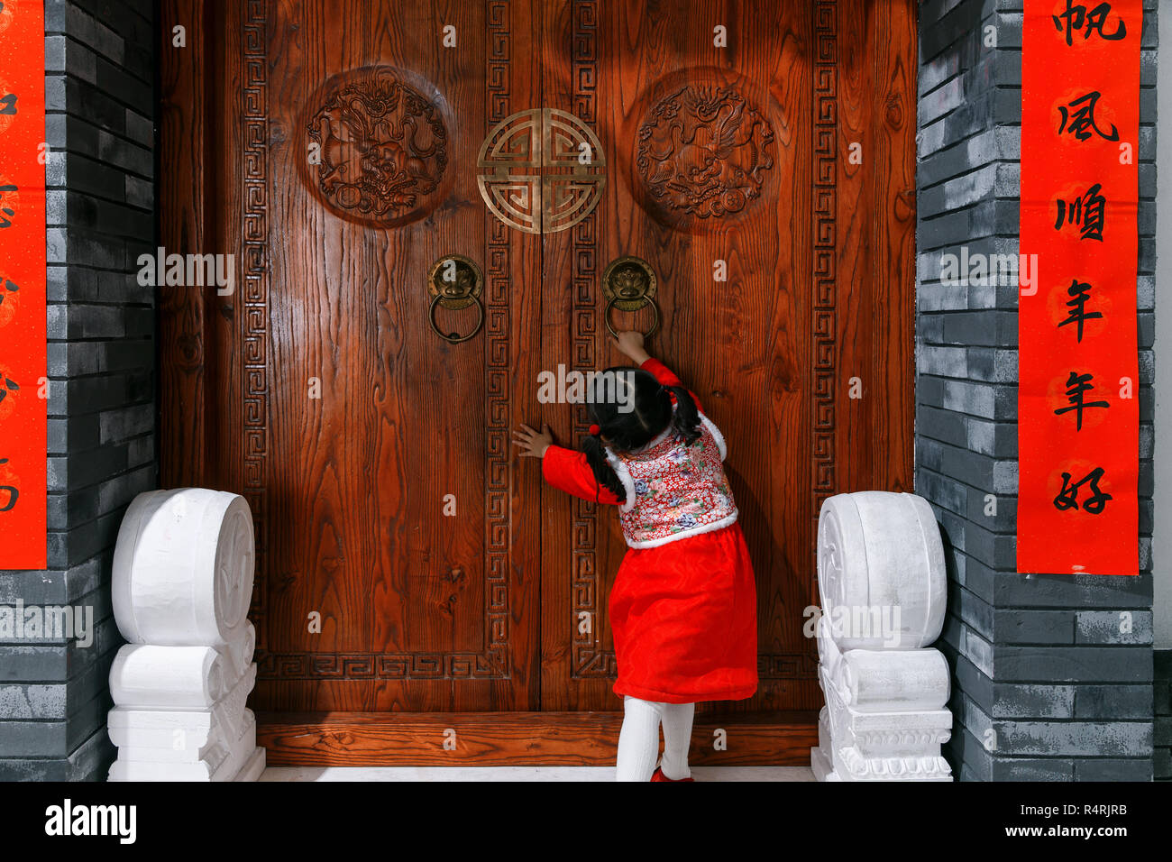 Rear view three little girls hi-res stock photography and images - Alamy