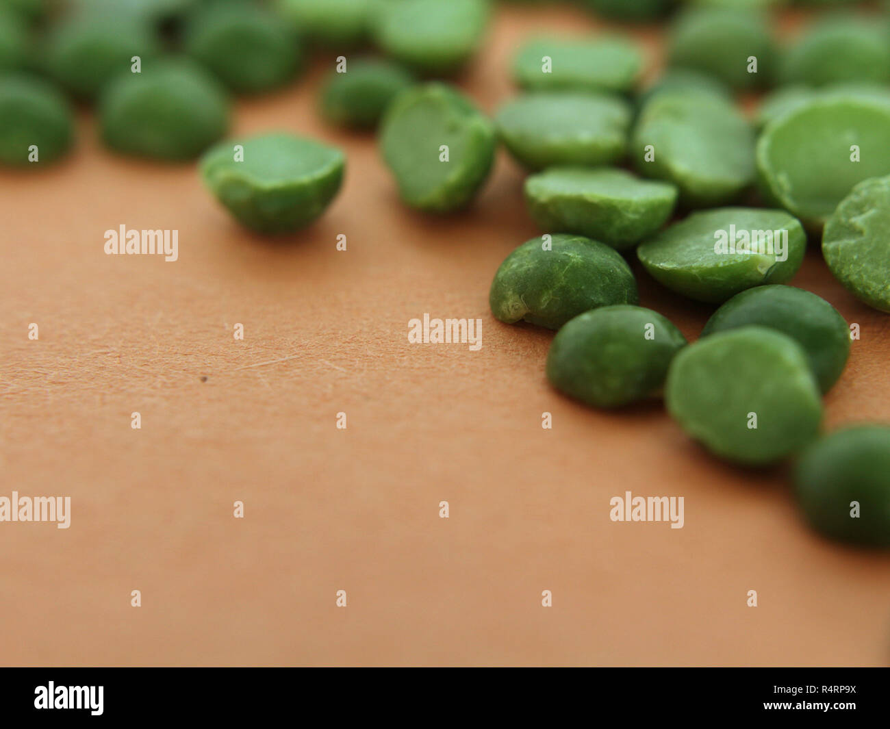 Green split peas, complementary colors Stock Photo - Alamy