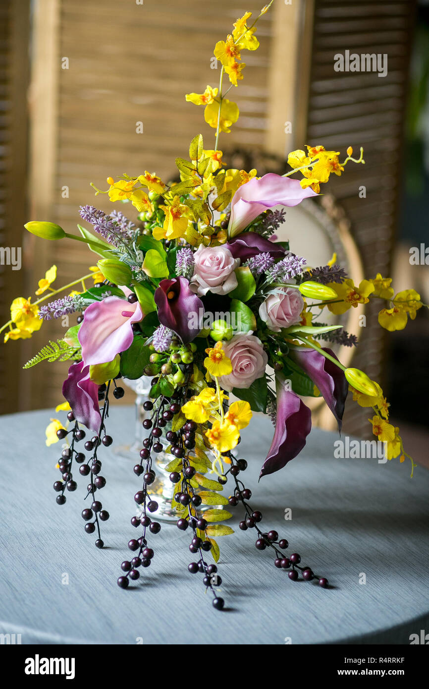 Bouquet Of Beautiful Mixed Flowers In Vase On A Table
