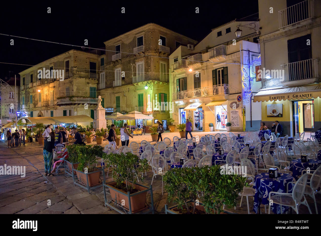 Tropea, Italy - September 06, 2016: People visit illuminated Tropea old town in summer night Stock Photo