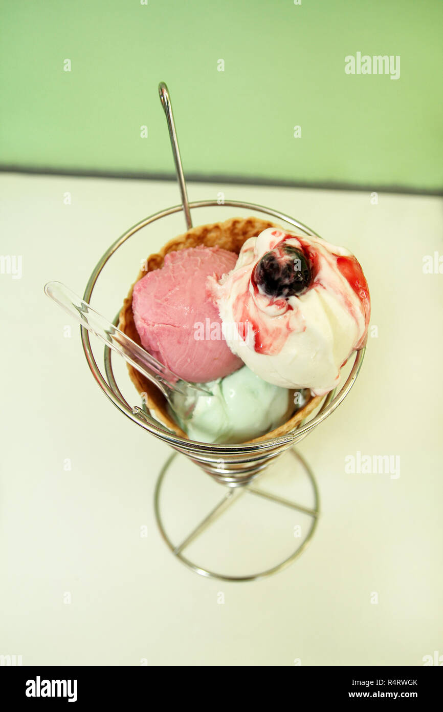 Ice Cream Holders. Strawberry, mint, vanilla with sour cherry ice cream