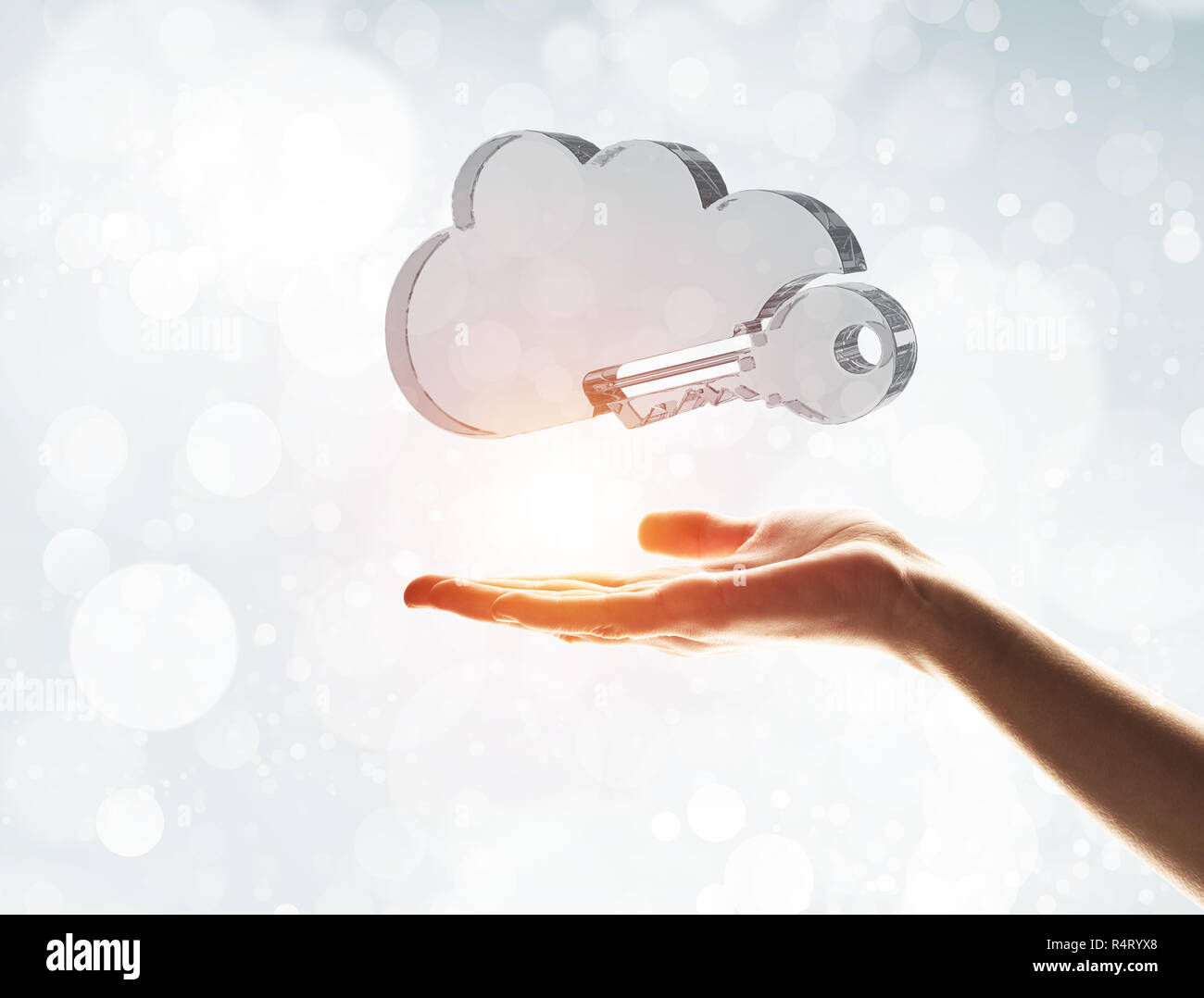Cloud computing concept with glass symbol shown in hand Stock Photo