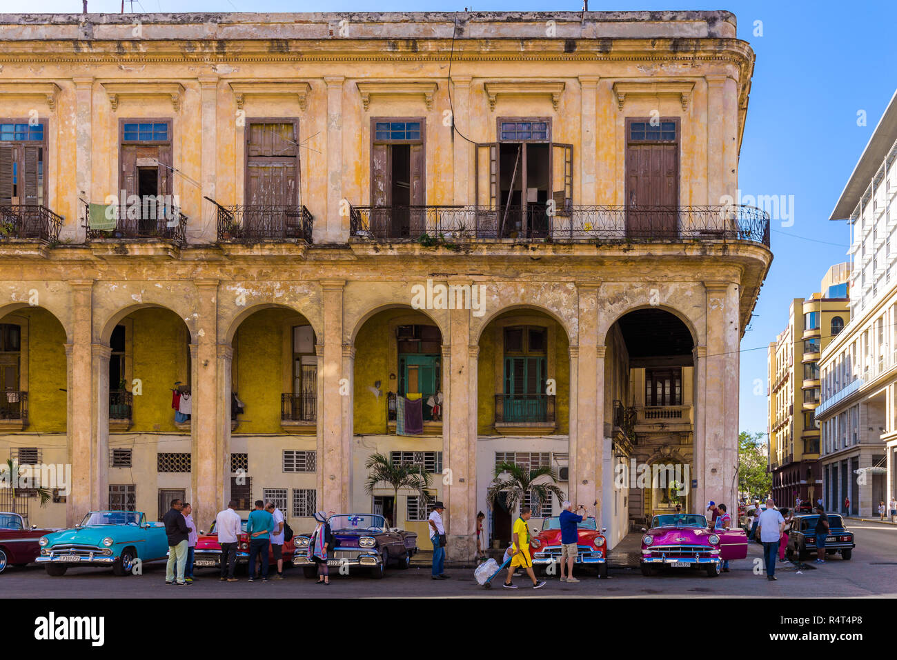 Classic colorful american car on the street of Havana. These cars are used as taxi for tourists and are typical of the Cuban capital. Stock Photo