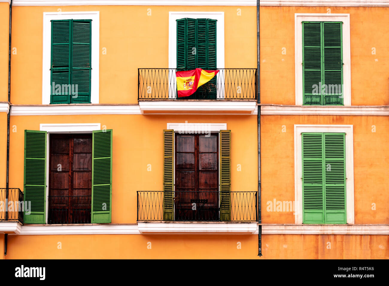 Spanish balcony with flag Stock Photo