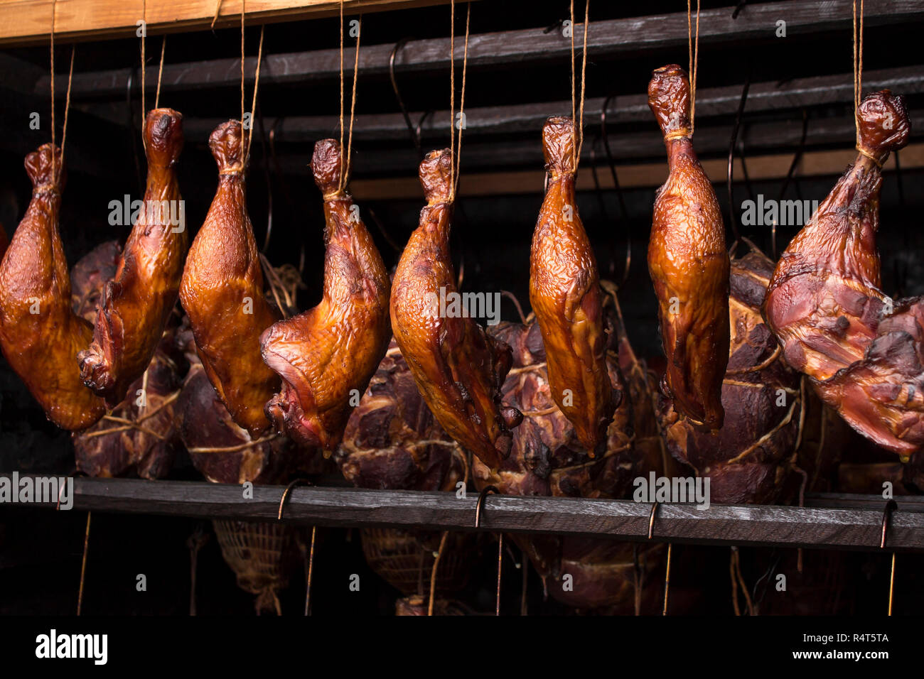 stages of smoking. readysmoked meat in the smokehouse Stock Photo Alamy