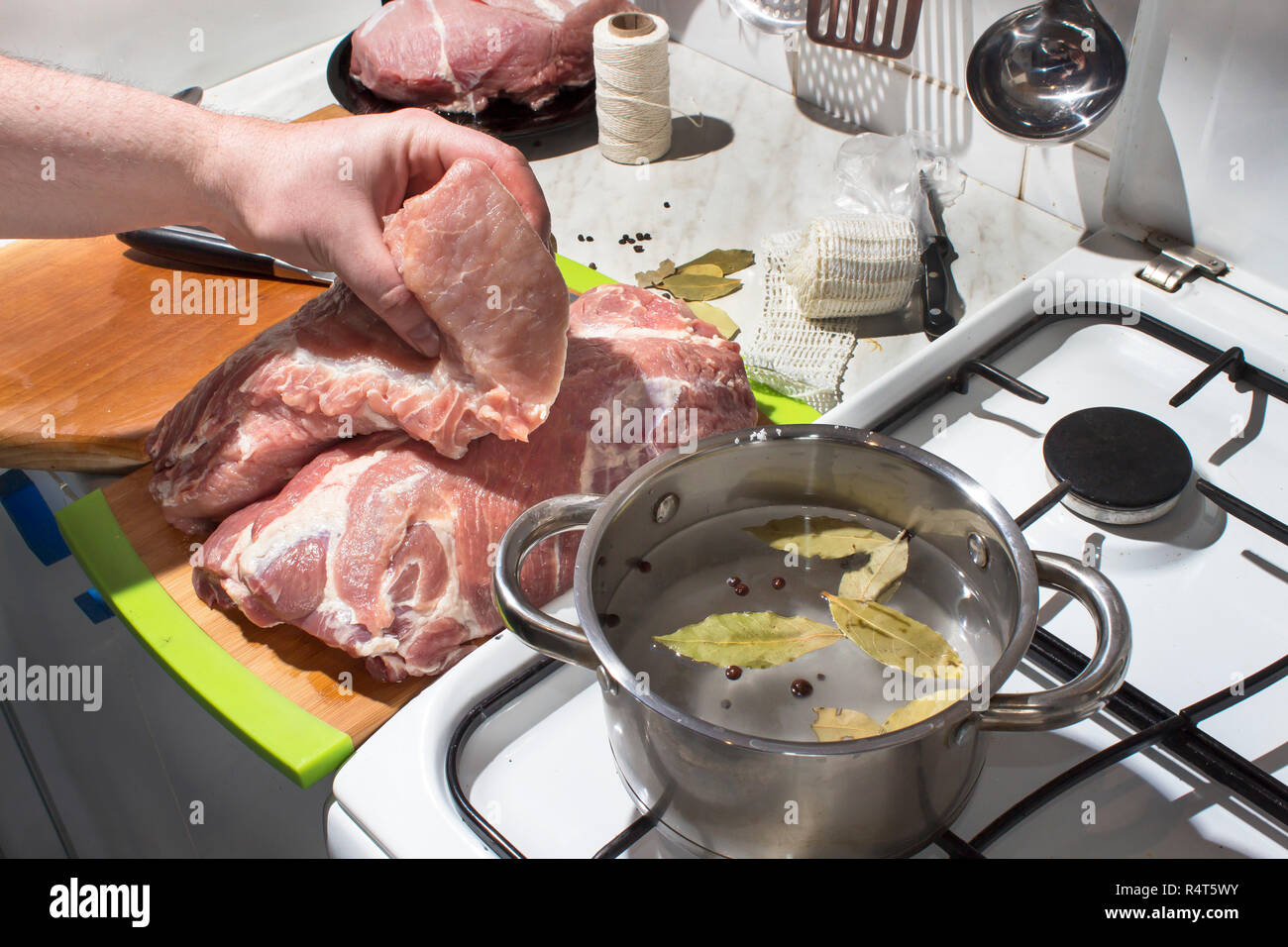 preparation raw meat for smoking. pork neck meat and bacon. soaking of