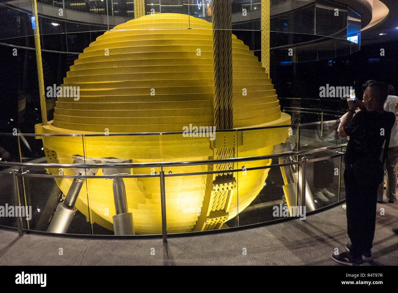 Huge,Damper,dampers,weight,counterweight,balance,at,top,of,observatory,tower,at,Taipei 101 Tower,Taipei,Chinese,China,Republic of China,ROC,Asia,Asian Stock Photo