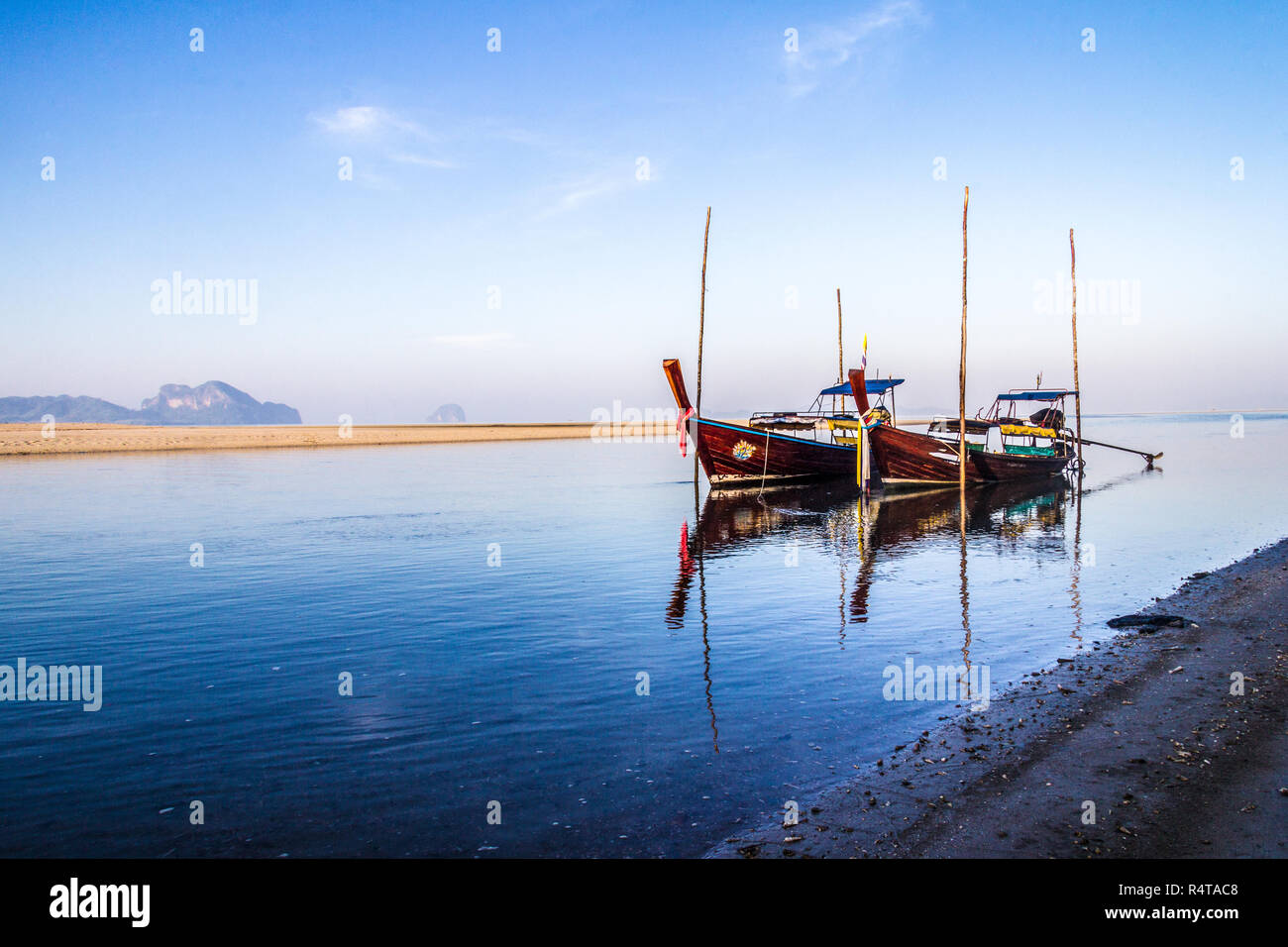 Long tail boats moored in river estuary, Pak Meng, Trang Province, Thailand Stock Photo