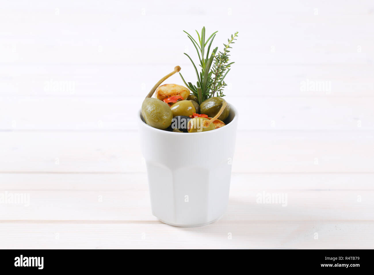 pickled olives, capers, caper berries and garlic Stock Photo Alamy