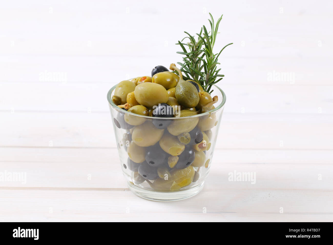 green and black olives with capers and caper berries Stock Photo Alamy