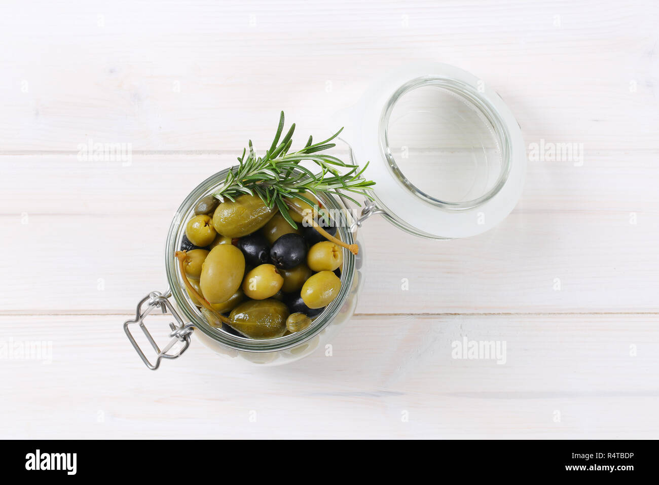 green and black olives with capers and caper berries Stock Photo Alamy