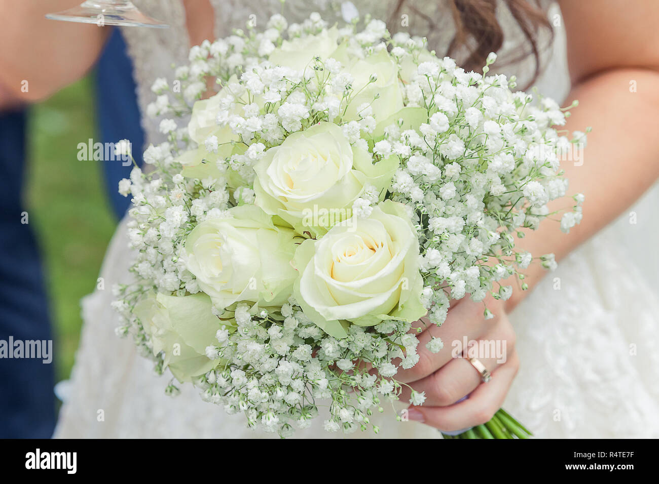 Image of wedding bouquet in bride's hands Stock Photo