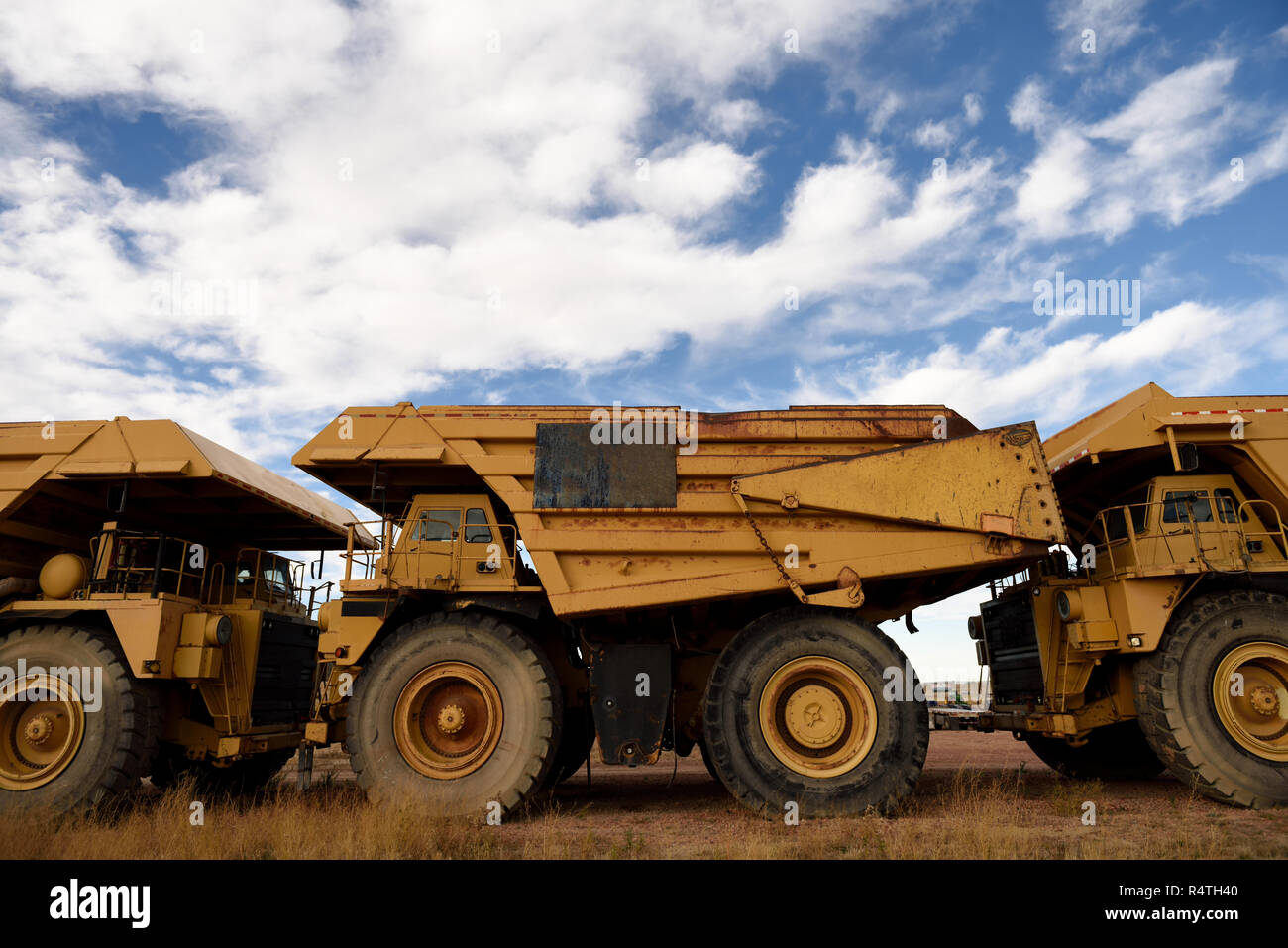Giant industrial coal mining trucks used for open pit coal mining in