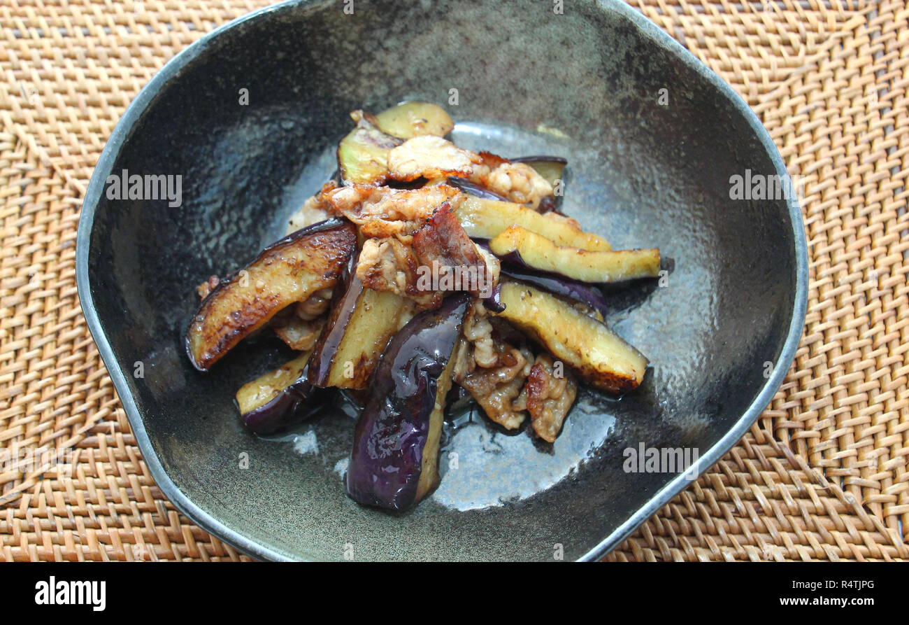 Grilled eggplant in black asian bowl Stock Photo Alamy