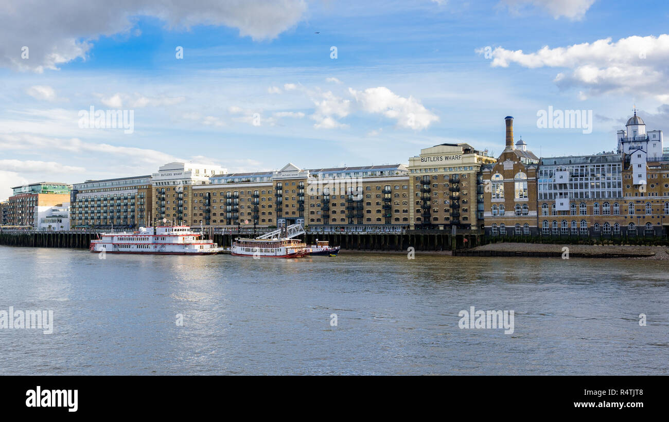 London, UK - Appril 26, 2018: Panoramic view of renovated Butlers Wharf on the south bank of the Thames River Stock Photo