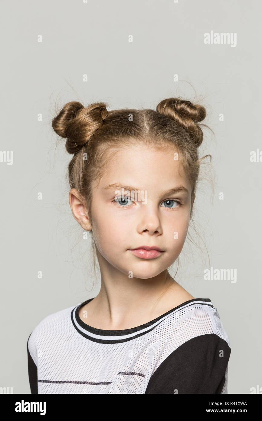 Double bun hairstyle hi-res stock photography and images - Alamy