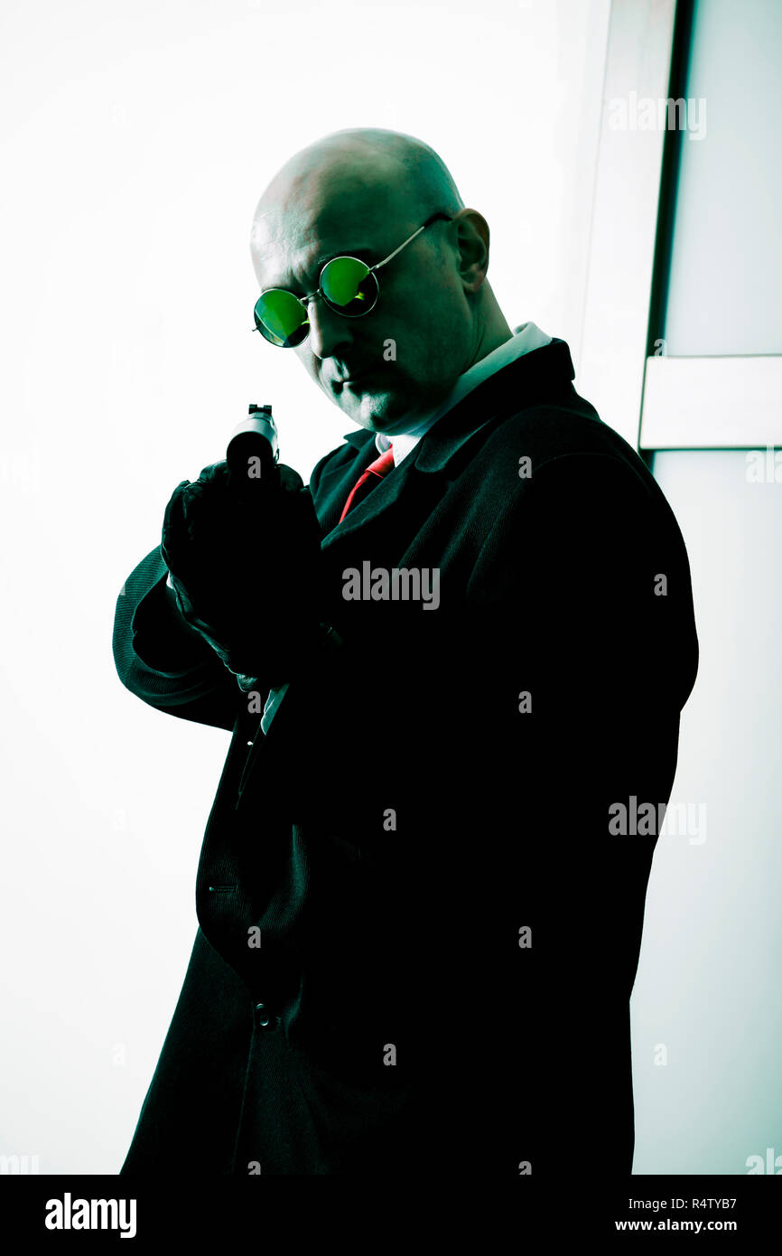 Armed secret agent Stock Photo