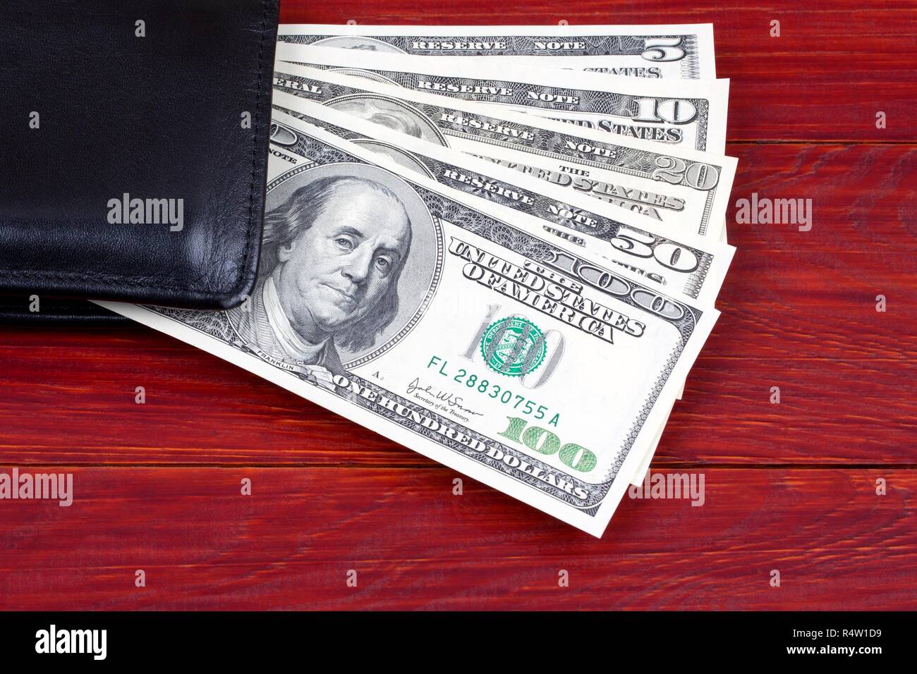 American dollars in the black wallet Stock Photo Alamy