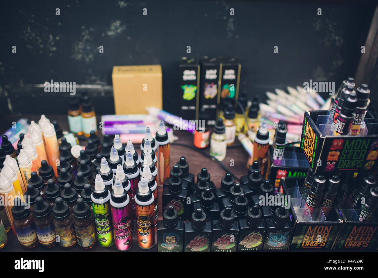 Ufa, Russia, South Vape Shop, 5 November, 2018: E-liquid e-juice High vape  for electronic cigarette vaping device , on counter in smoke vapor in vape  bar in bottles Stock Photo - Alamy
