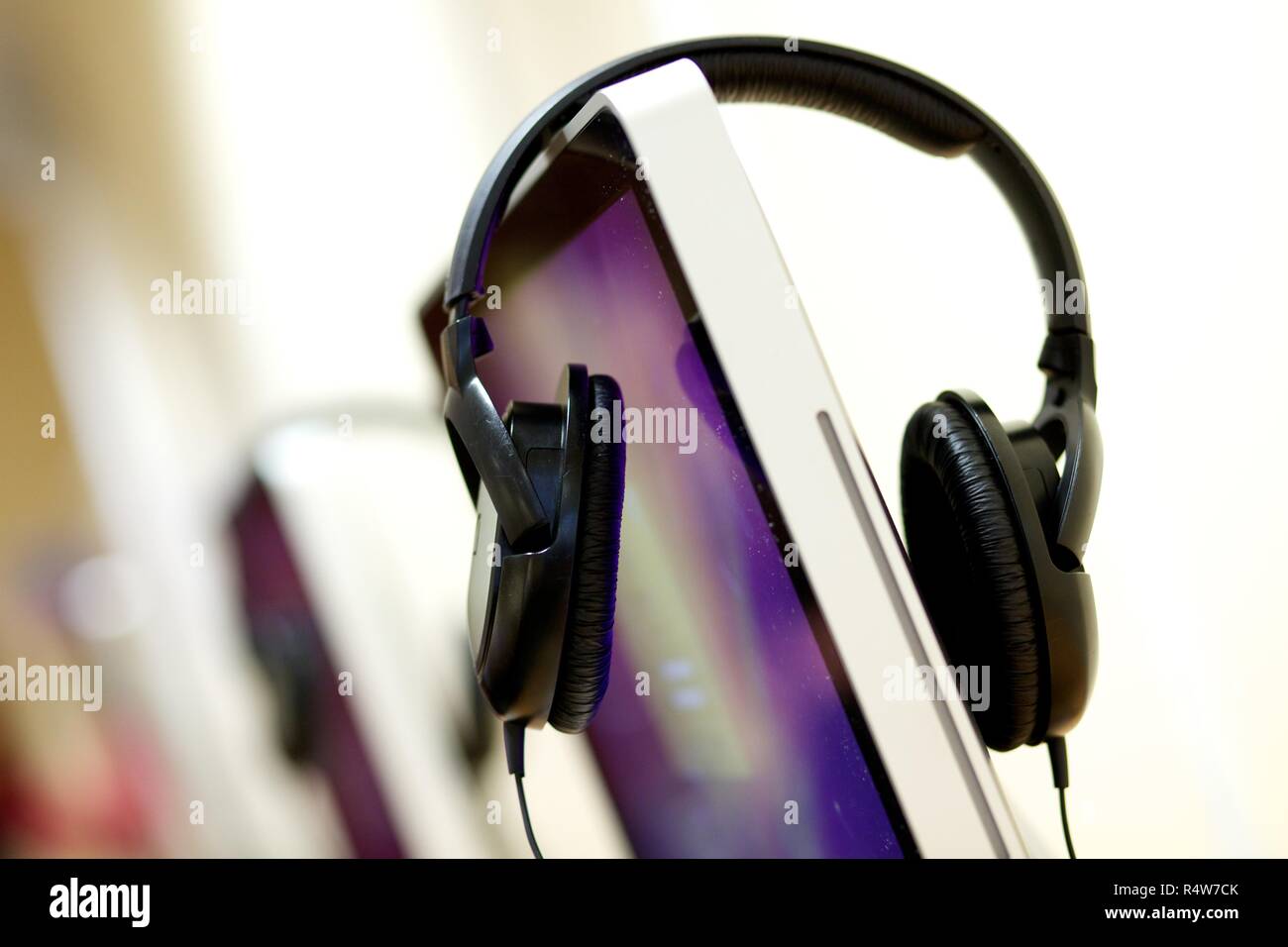 Headphones and desktop computer Stock Photo Alamy