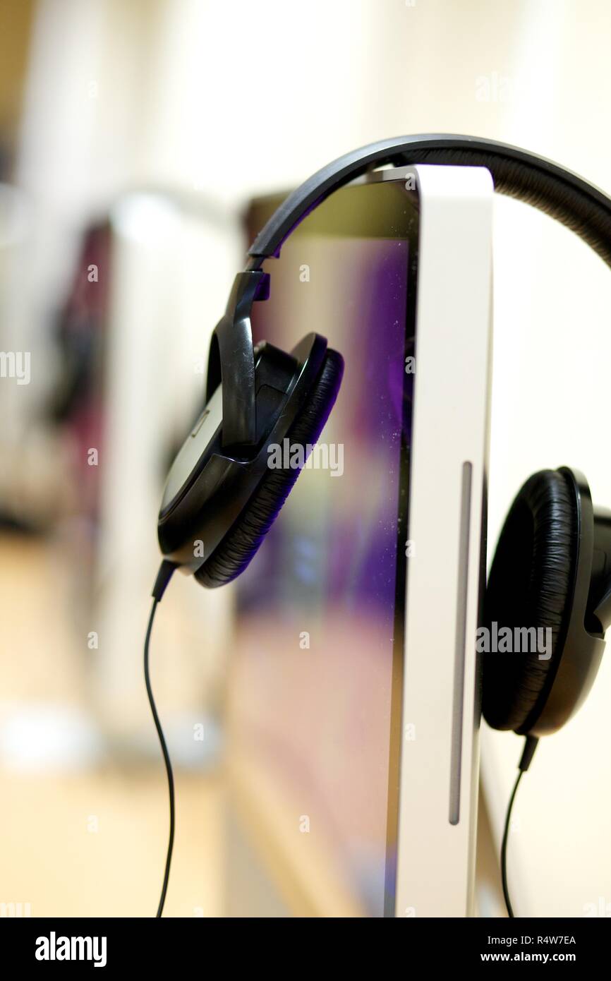 Headphones and desktop computer Stock Photo Alamy