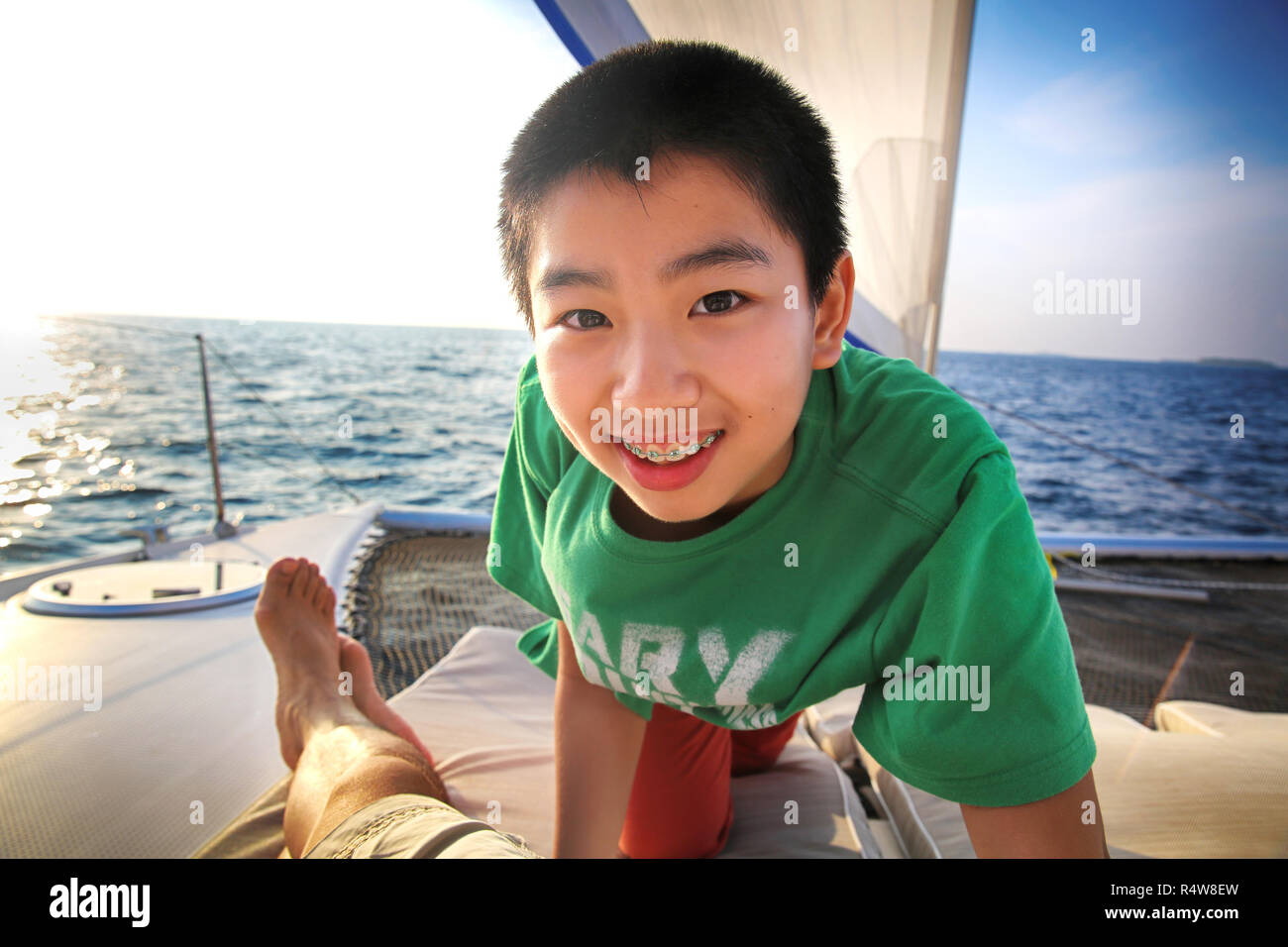 The boy on the yacht Stock Photo