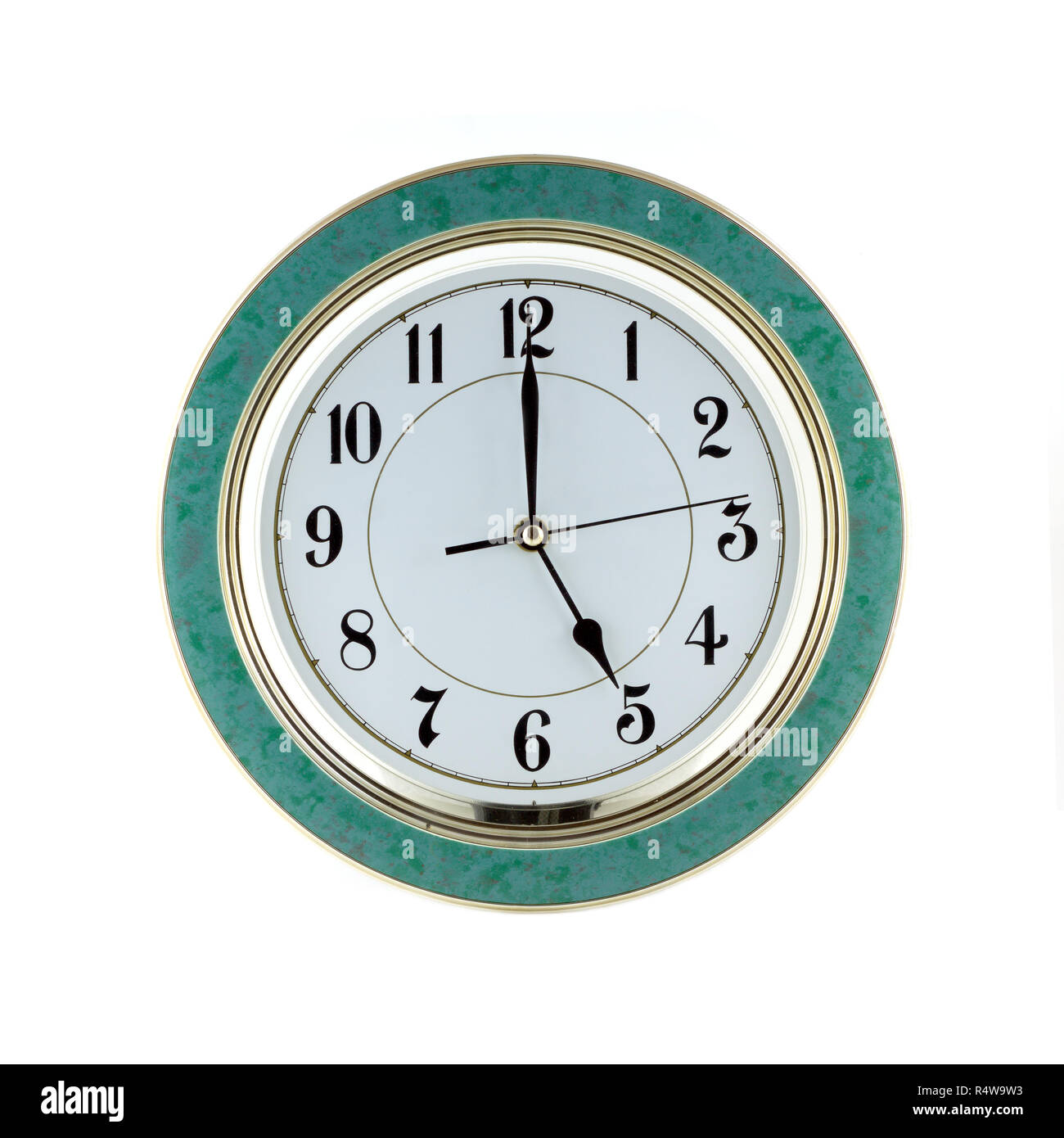 Round office wall clock shows five o'clock isolated on white closeup