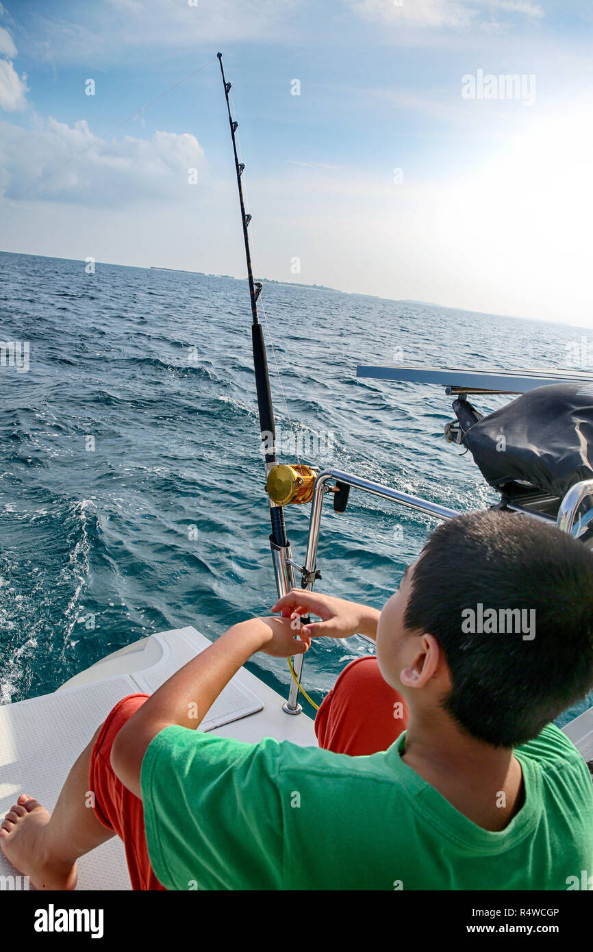 Sea fishing boy Stock Photo