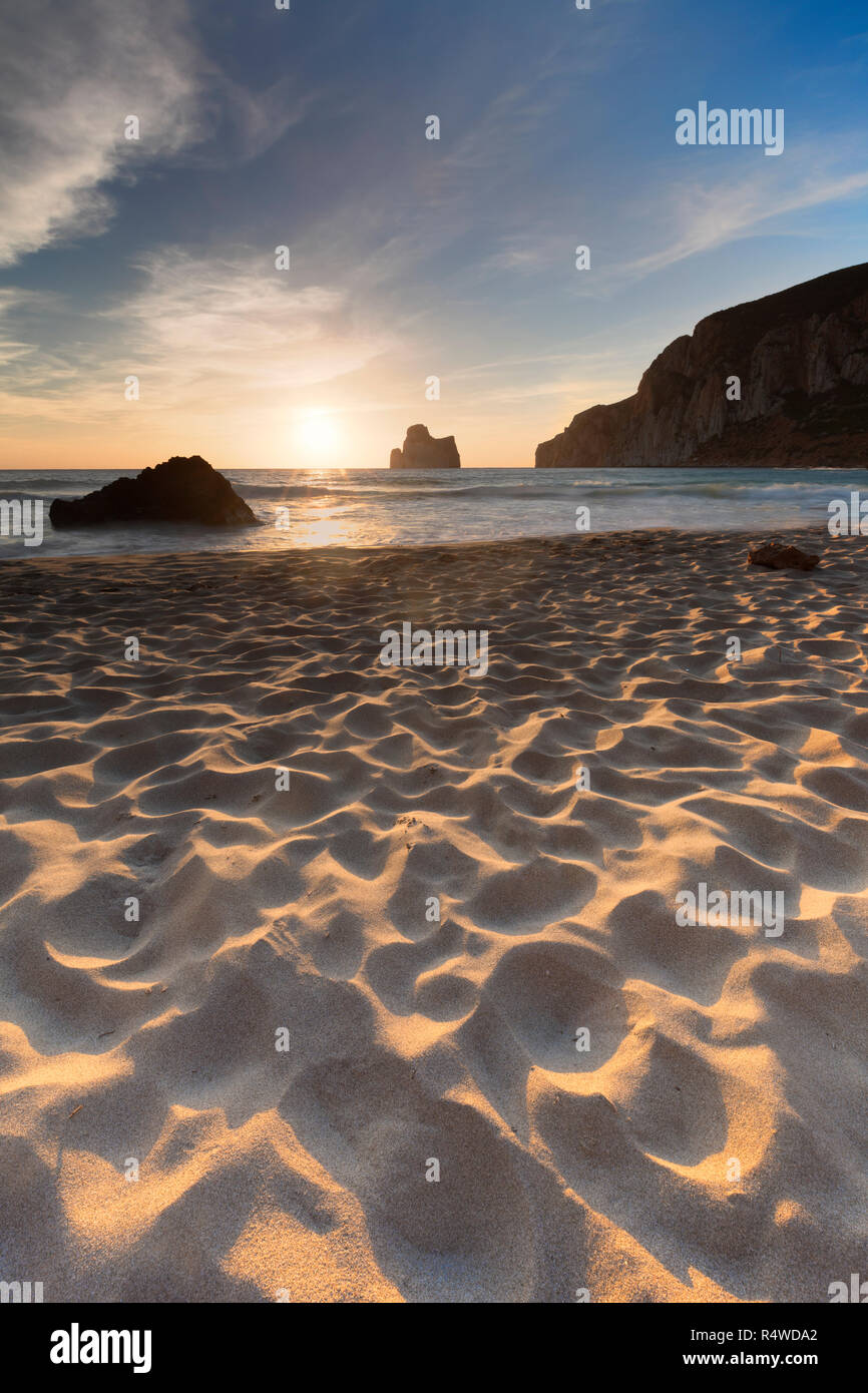 Waves at sunset on the Beach of Masua, Iglesias, Sud Sardegna province,  Sardinia, Italy, Europe Stock Photo - Alamy