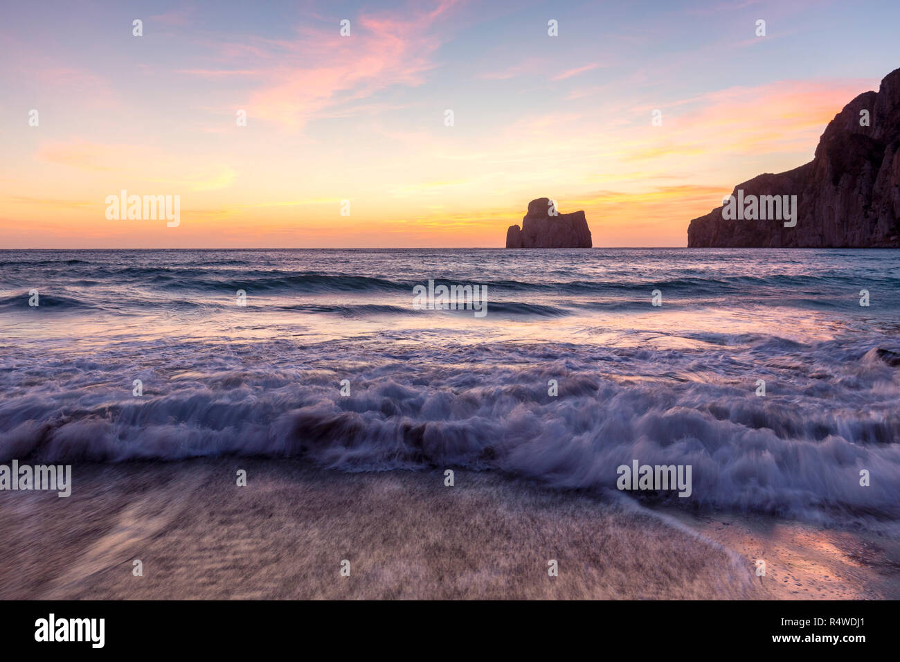 Waves at sunset on the Beach of Masua, Iglesias, Sud Sardegna province,  Sardinia, Italy, Europe Stock Photo - Alamy