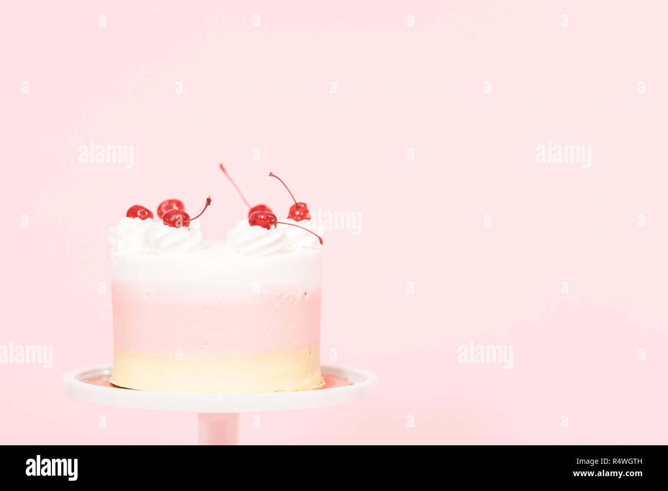 Birthday Spumoni cake on pink background. Stock Photo