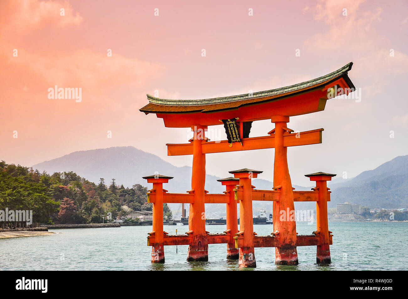 Miyajima, Hiroshima, Japan at the floating gate of Itsukushima Shrine. (gate sign reads Itsukushima Shrine) Stock Photo