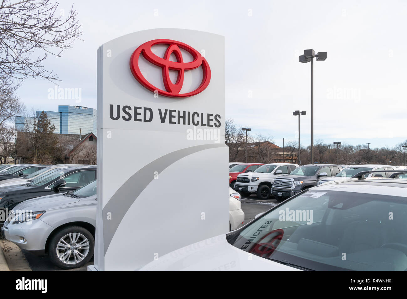 BLOOMINGTON, MN/USA - NOVEMBER 18, 2018: Toyota automobile dealership used car sign and trademark logo. Stock Photo
