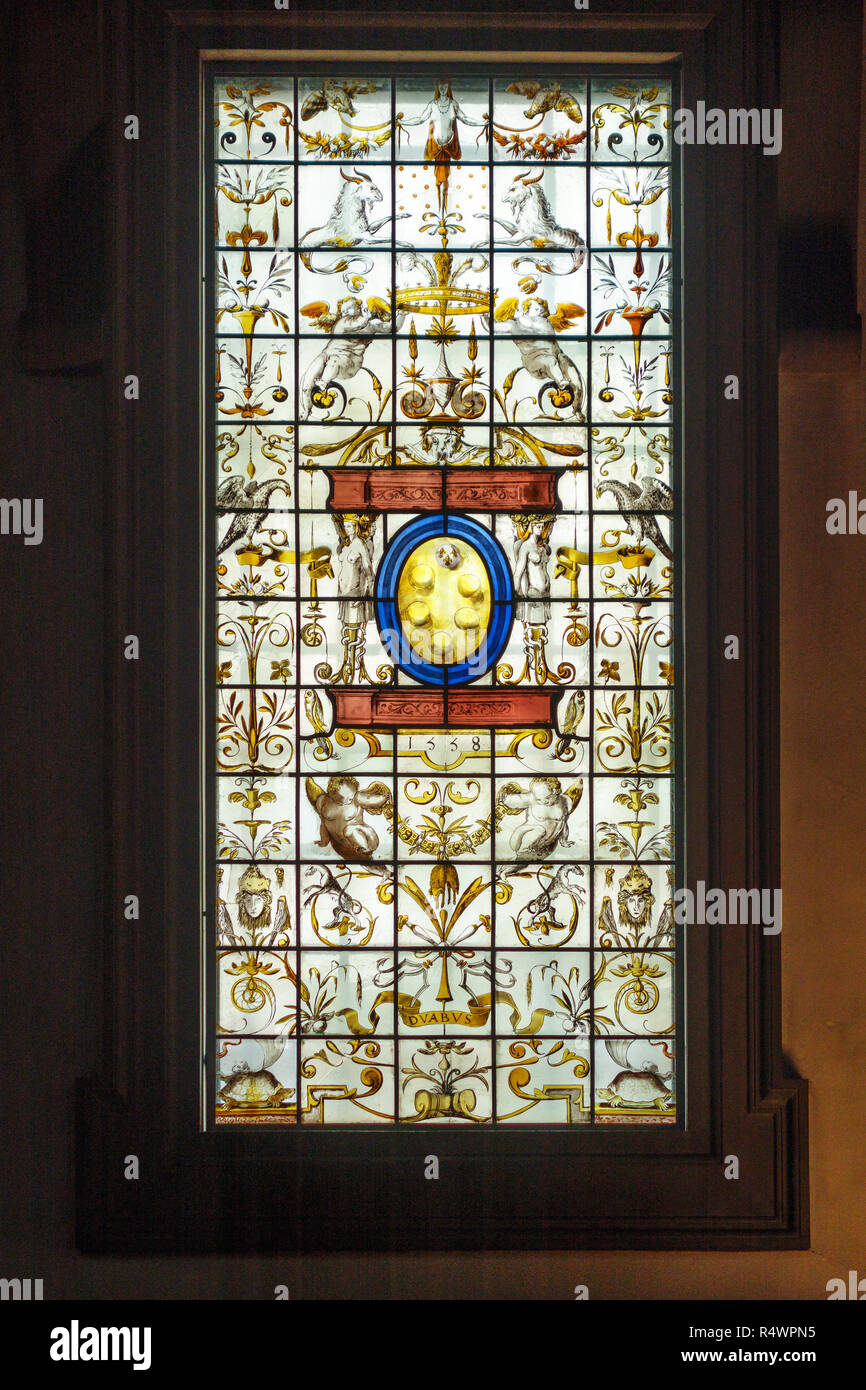 The Laurentian Library (Biblioteca Medicea Laurenziana), Florence, Italy. Sixteenth century stained-glass window bearing emblems of the Medici family Stock Photo