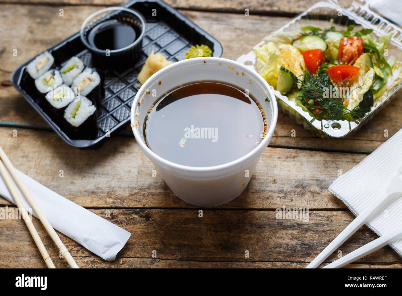 Food delivery concept background. Asian business lunch on grunge wooden table Stock Photo